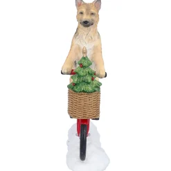 Standfiguren-Schäferhund auf Fahrrad